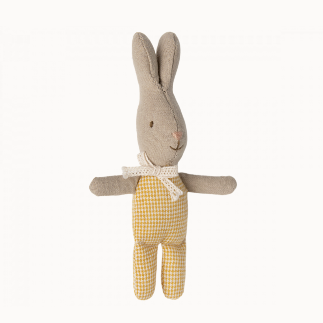 A small plush toy resembling a rabbit with a yellow checkered shirt and beige body, named 'My Rabbit'.