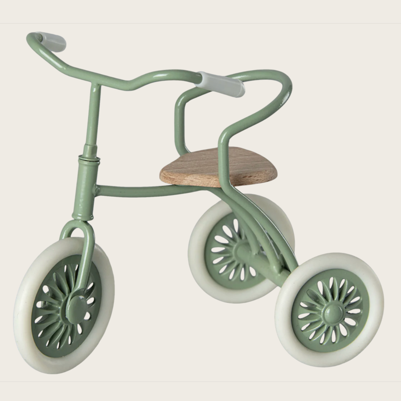 A green toy tricycle with wooden accents, designed for big sibling mice according to the given product information.