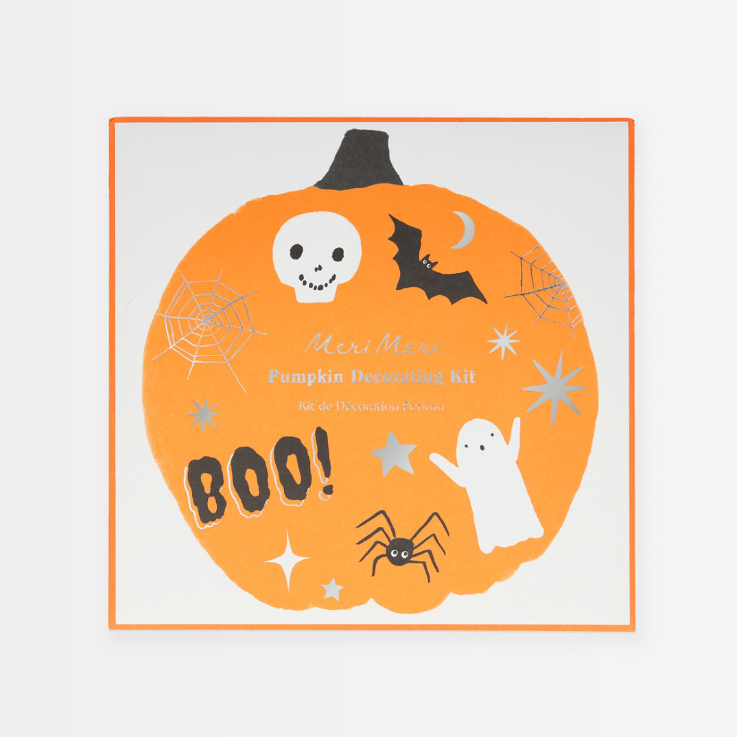 Packaging of a Pumpkin Decorating Kit with pumpkin and Halloween themed illustrations, including characters like an owl and a bat, and text reading 'BOO!'.