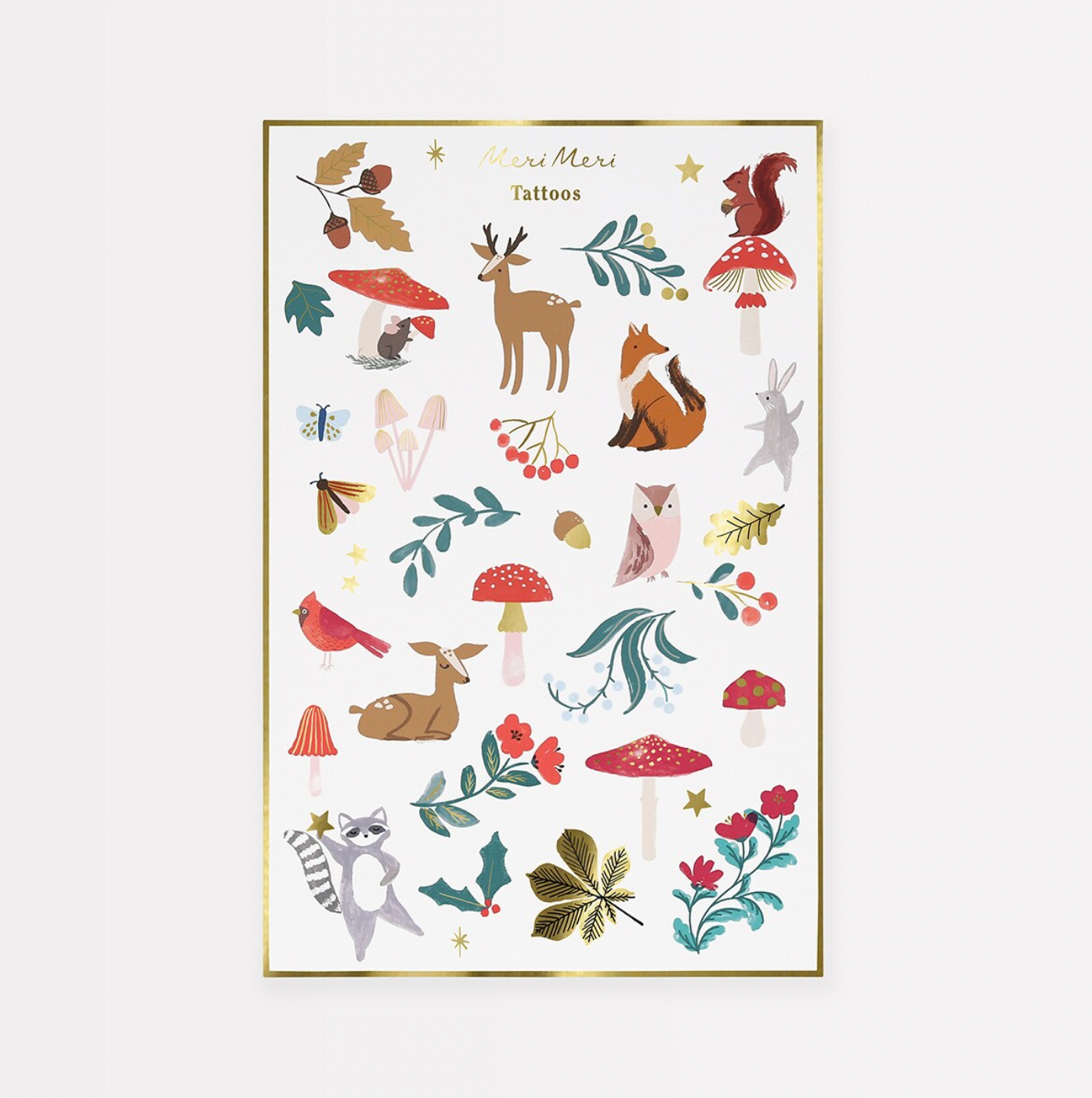 A sheet of temporary tattoos featuring various woodland animals and flowers, with shiny gold foil details.