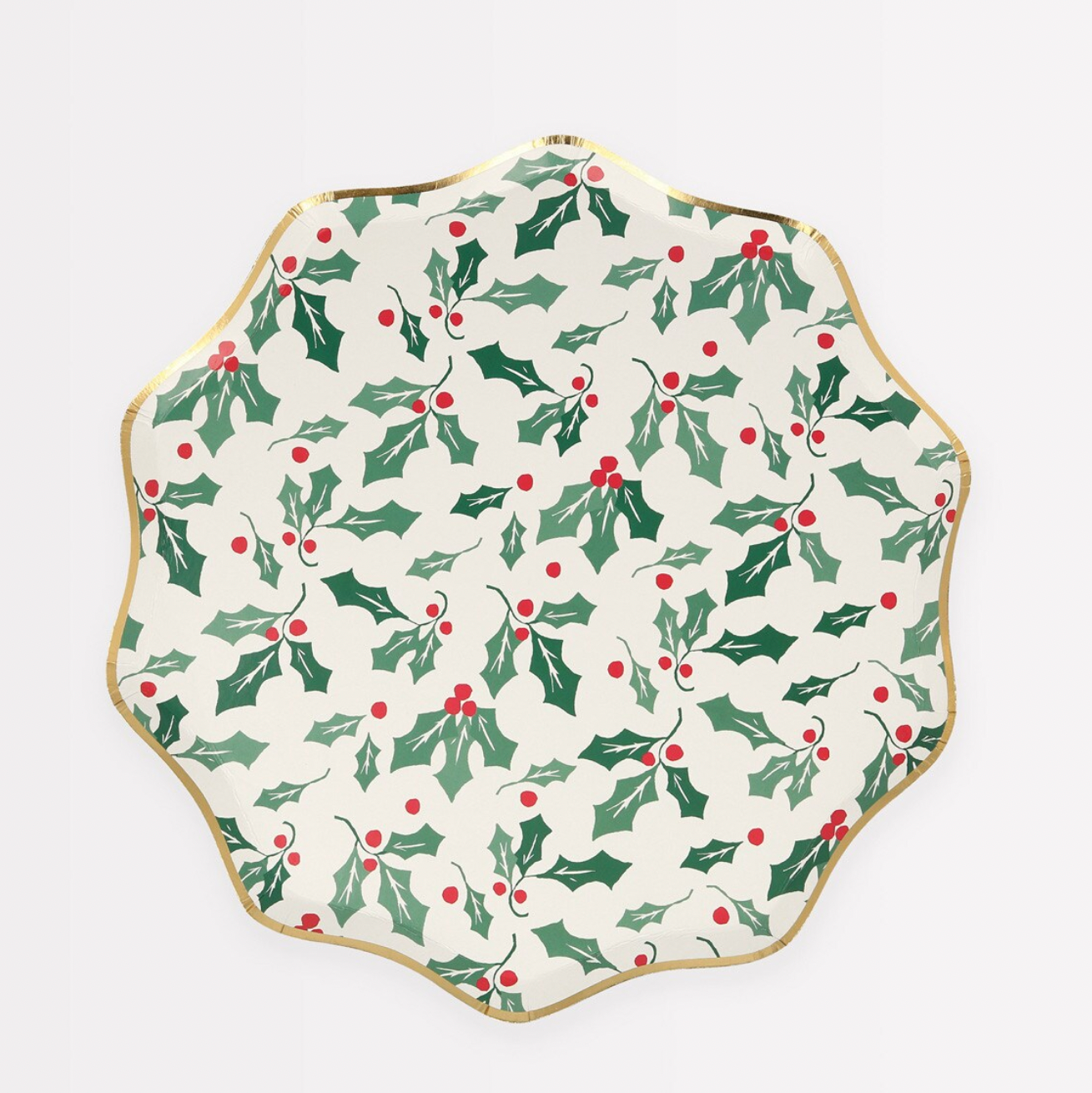 A round paper plate with a Christmas holly pattern and gold foil details around the edge.