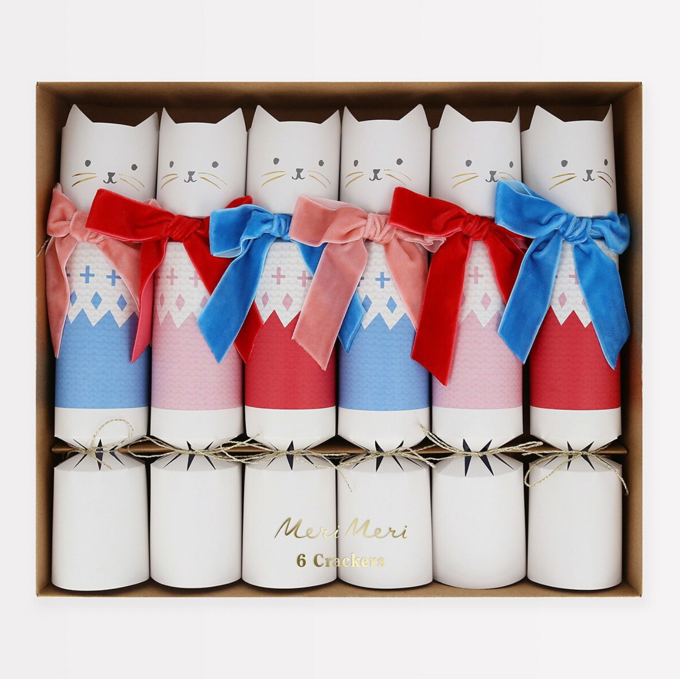 A set of six Christmas crackers designed with cat silhouettes, featuring different colored fair isle knit patterns and velvet bows.