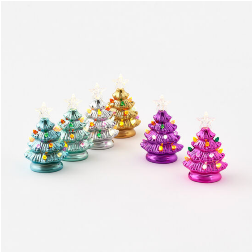 A set of small, decorative Christmas trees with multicolored lights.