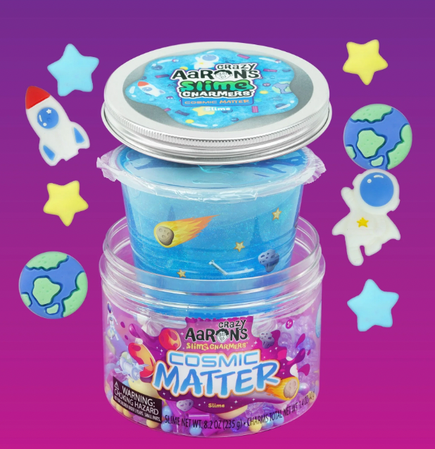 container of Aaron's Slime on a purple background with space-themed decorations.