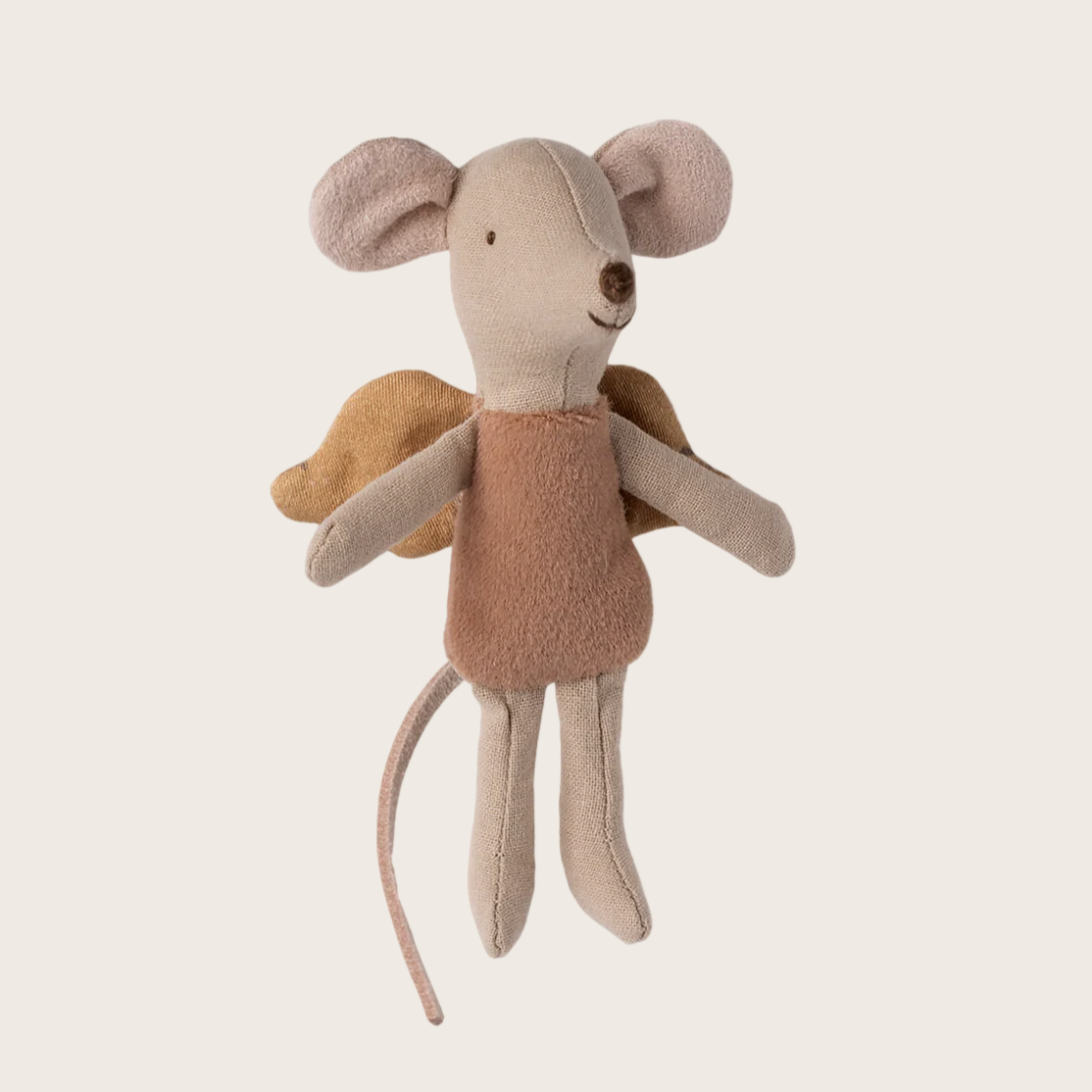 Stuffed toy mouse with fairy wings on a light gray background