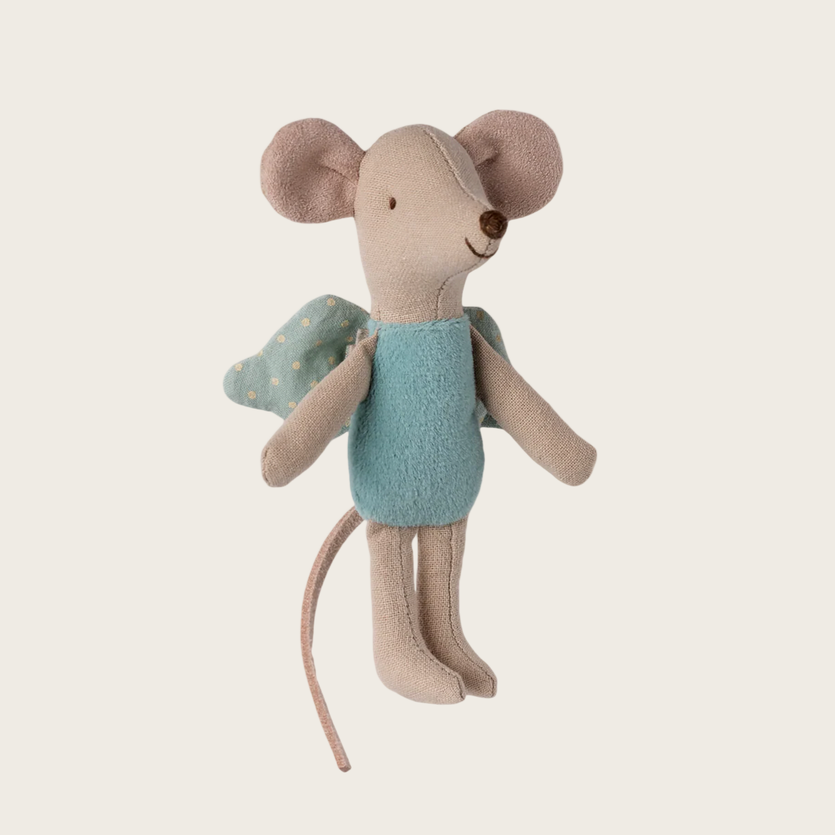Stuffed toy mouse with a blue dress on a light gray background