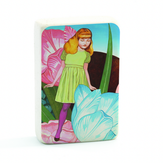 eraser with a girl in a green dress standing next to a large blue flower on a white background