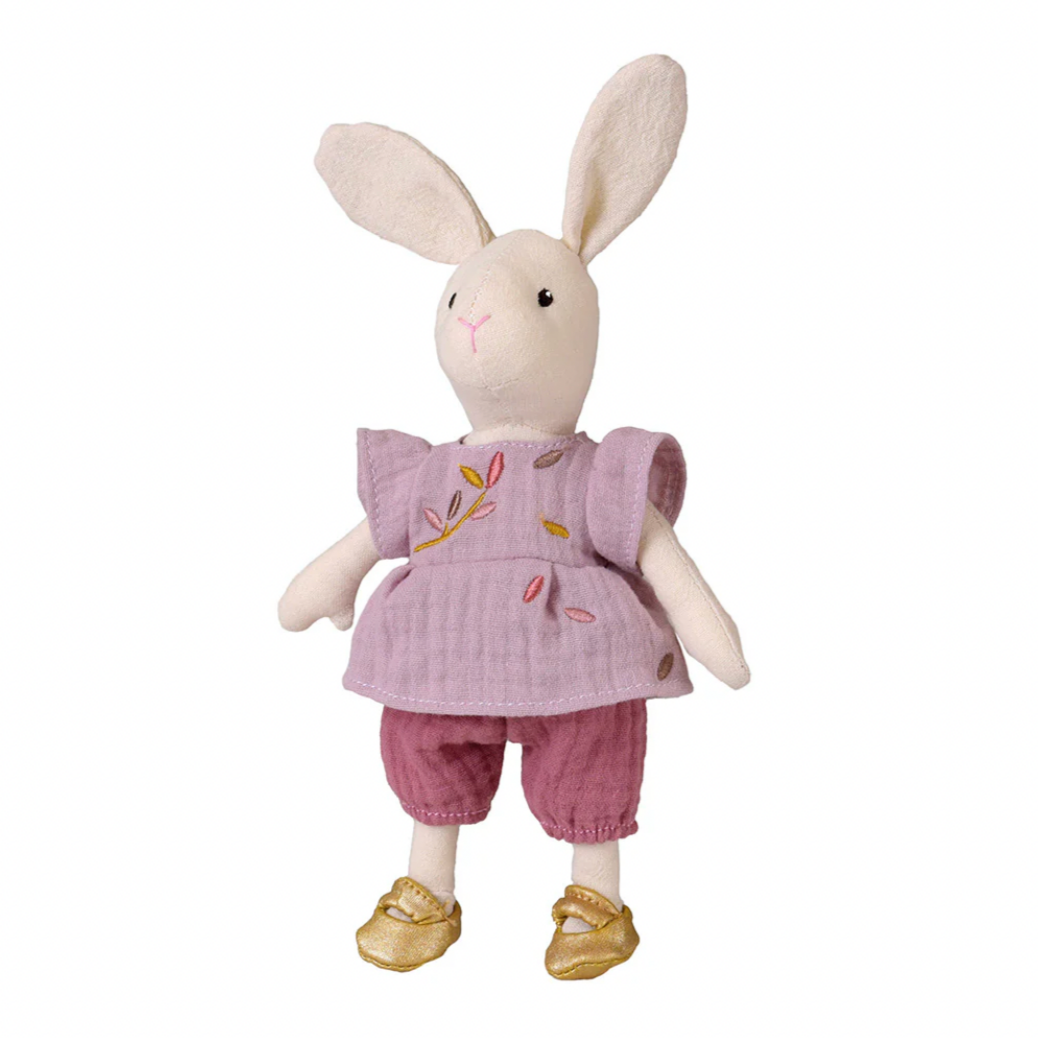 Stuffed rabbit toy wearing a pink outfit with floral embroidery on a white background