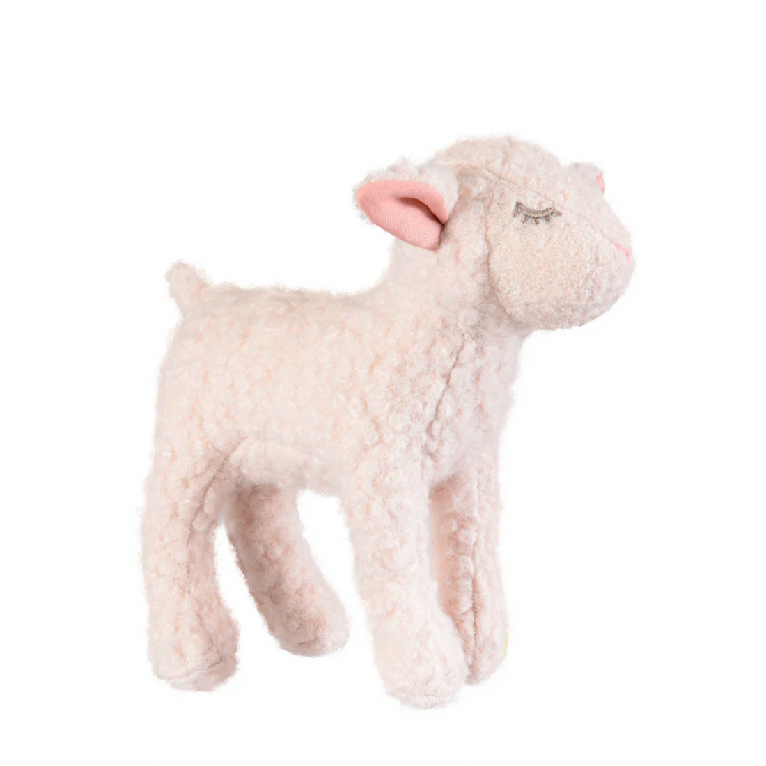 Plush lamb toy on a white background.