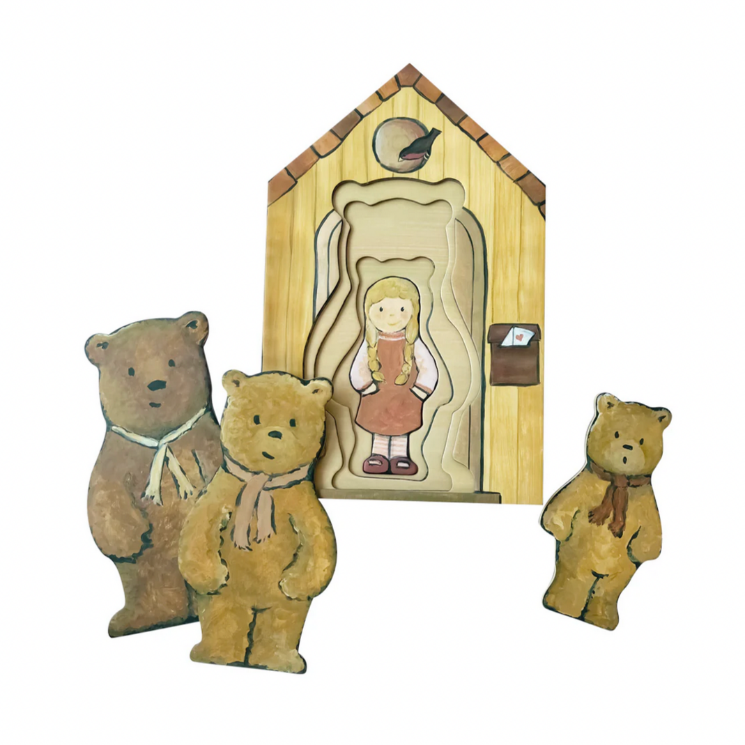 Wooden bear family with a house-shaped frame on a website page.