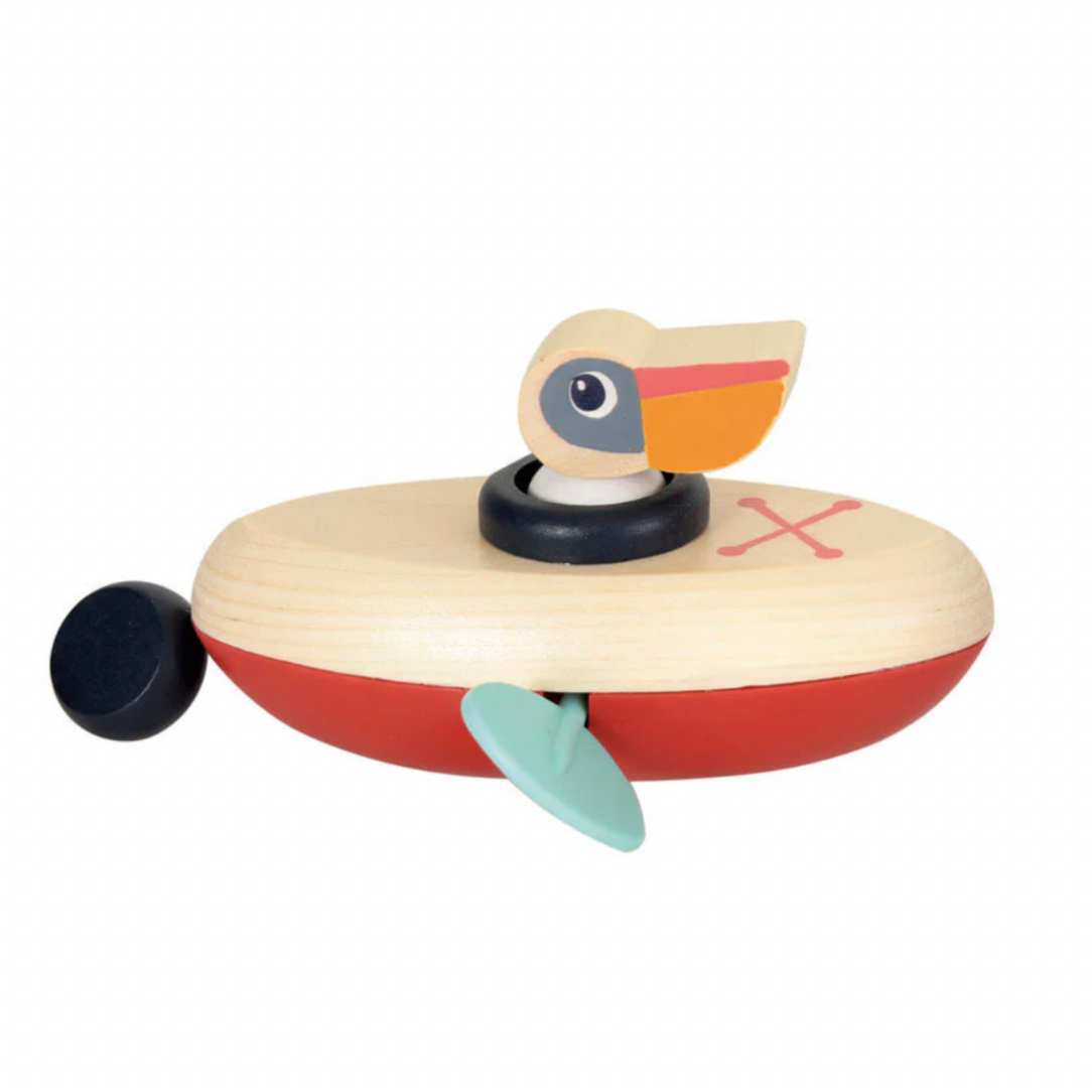 Wooden toy pelican with a clockwork mechanism .