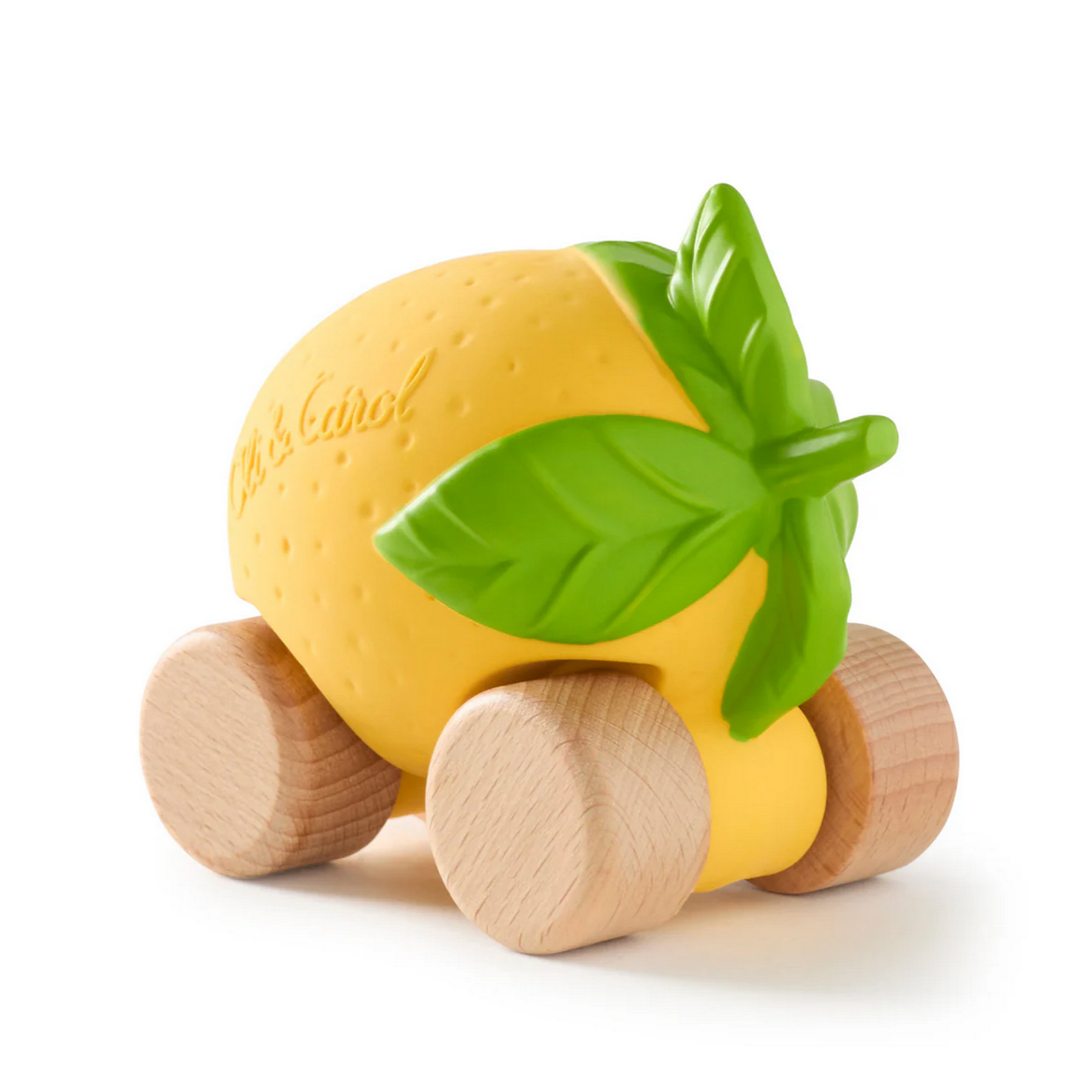 Toy lemon with wooden wheels on a white background