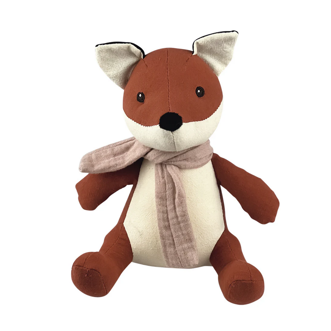 Plush toy fox with a scarf on a white background