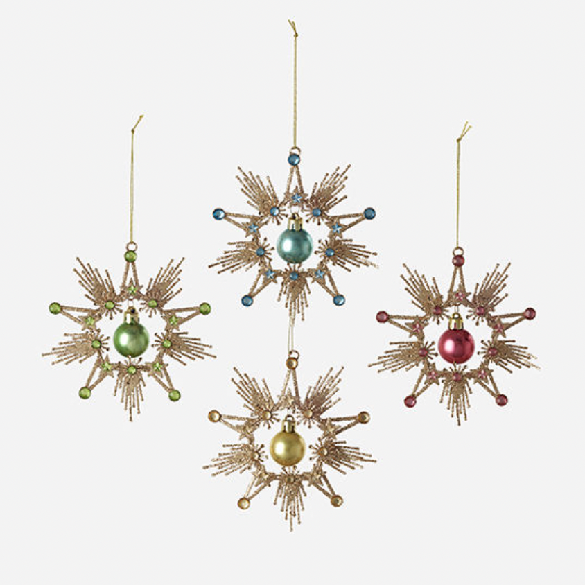 Decorative snowflake ornaments with colorful beads on a white background