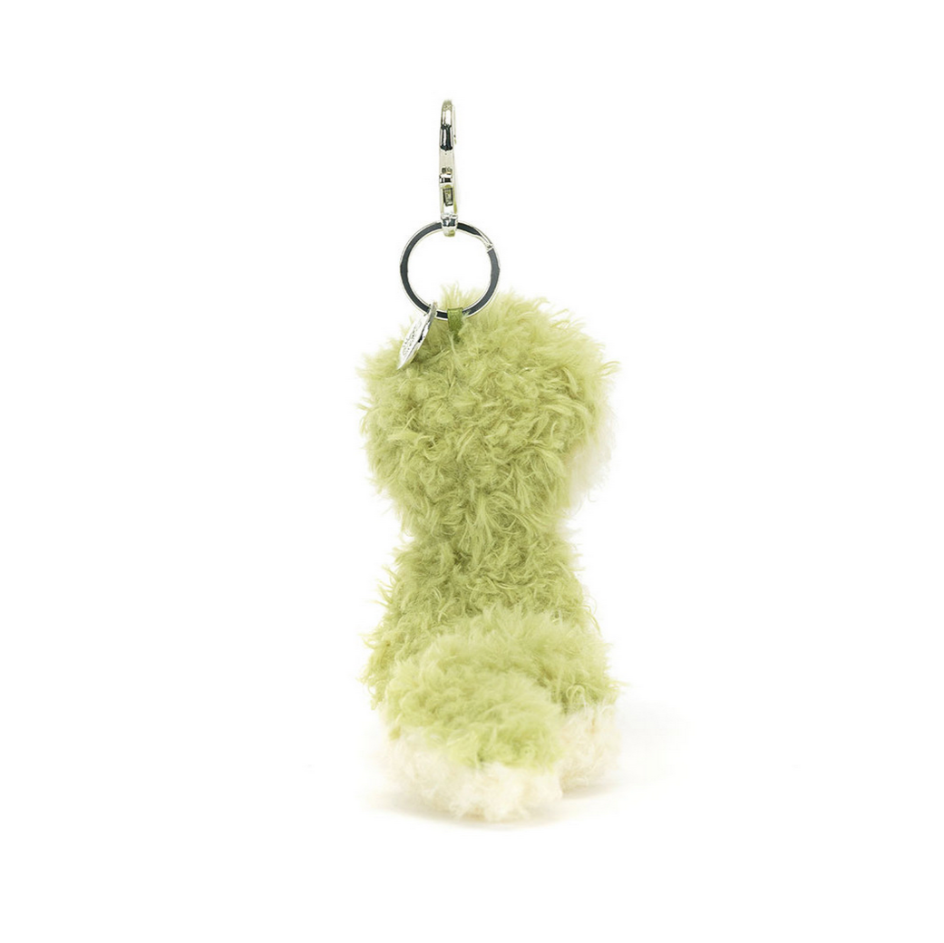 Green fuzzy keychain on a white background