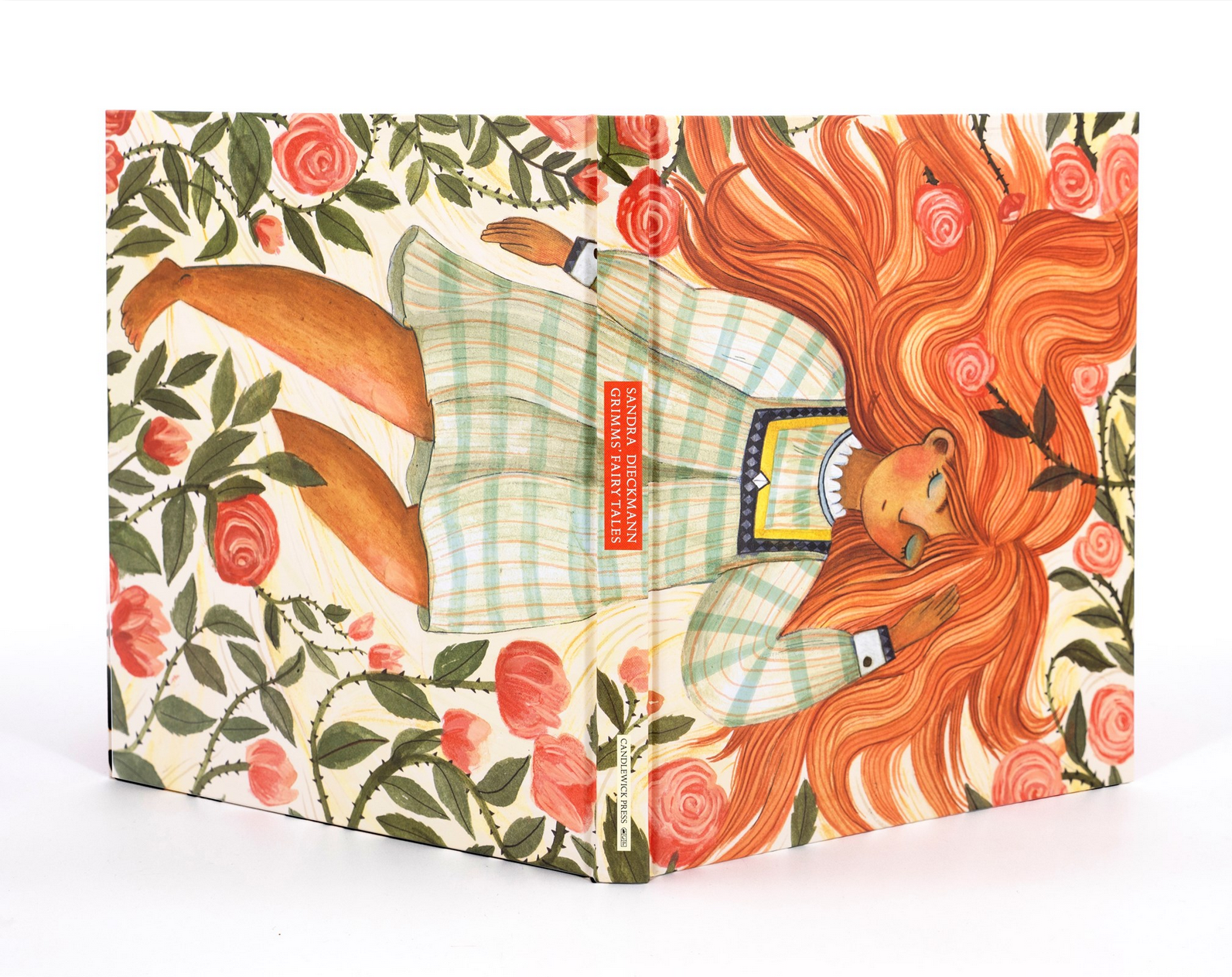 Book with a colorful illustration of a girl with red hair and flowers on the cover