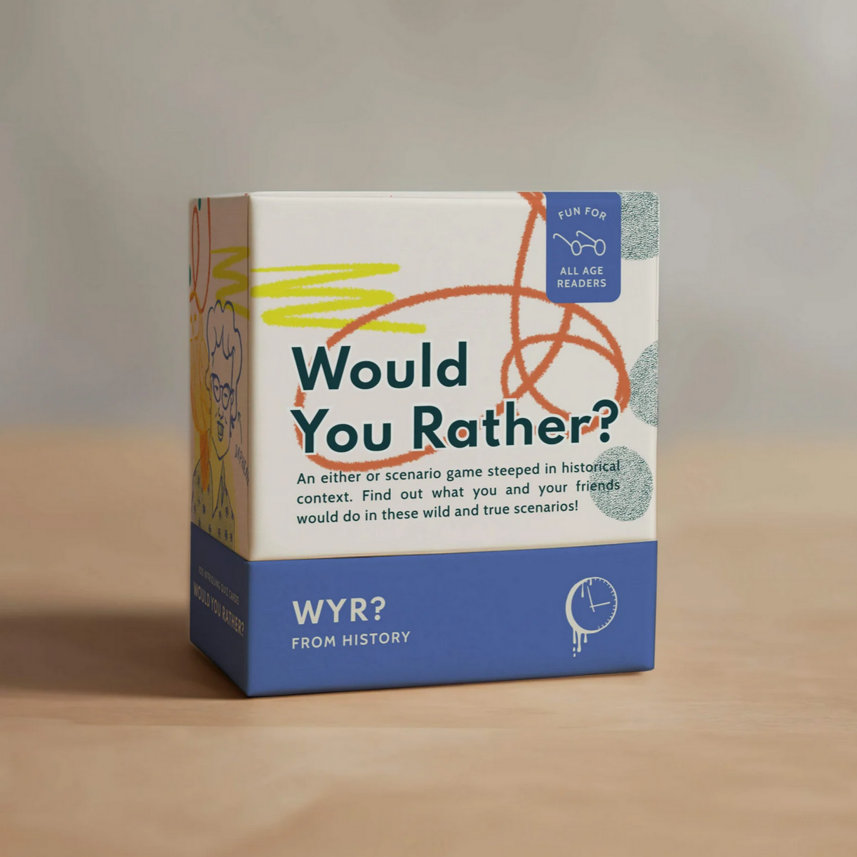 Card game box titled 'Would You Rather?' on a wooden surface with a neutral background