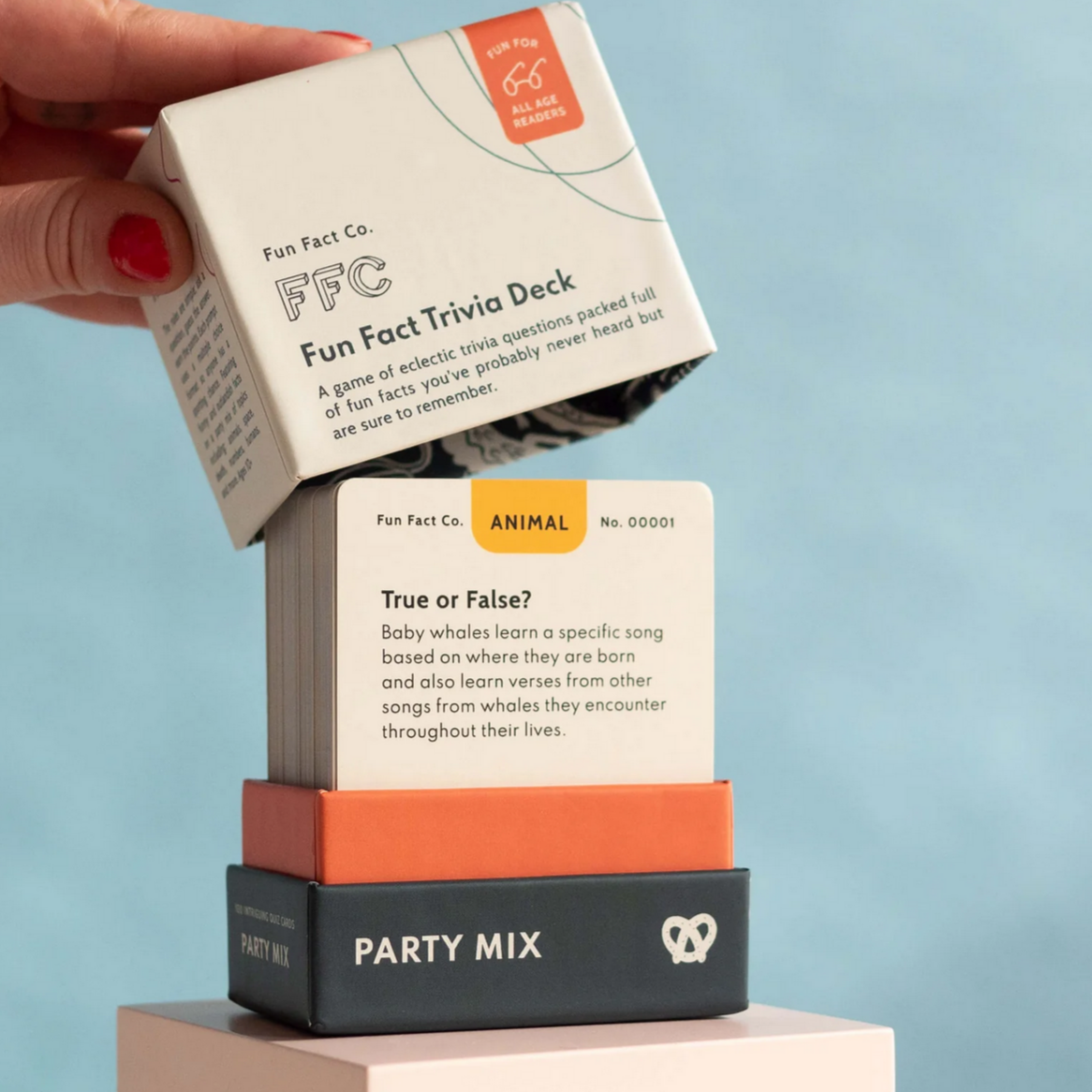 Stack of card decks with 'Fun Fact Co.' branding on a light blue background