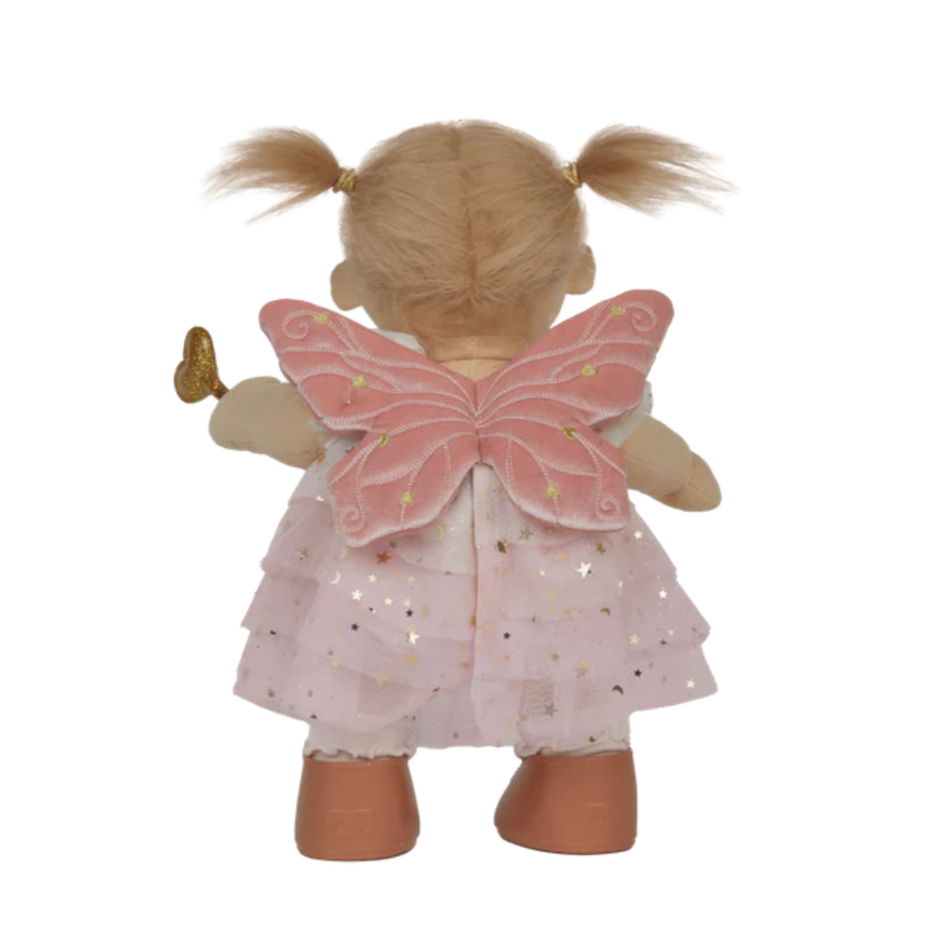 Stuffed doll with fairy wings and dress on a white background