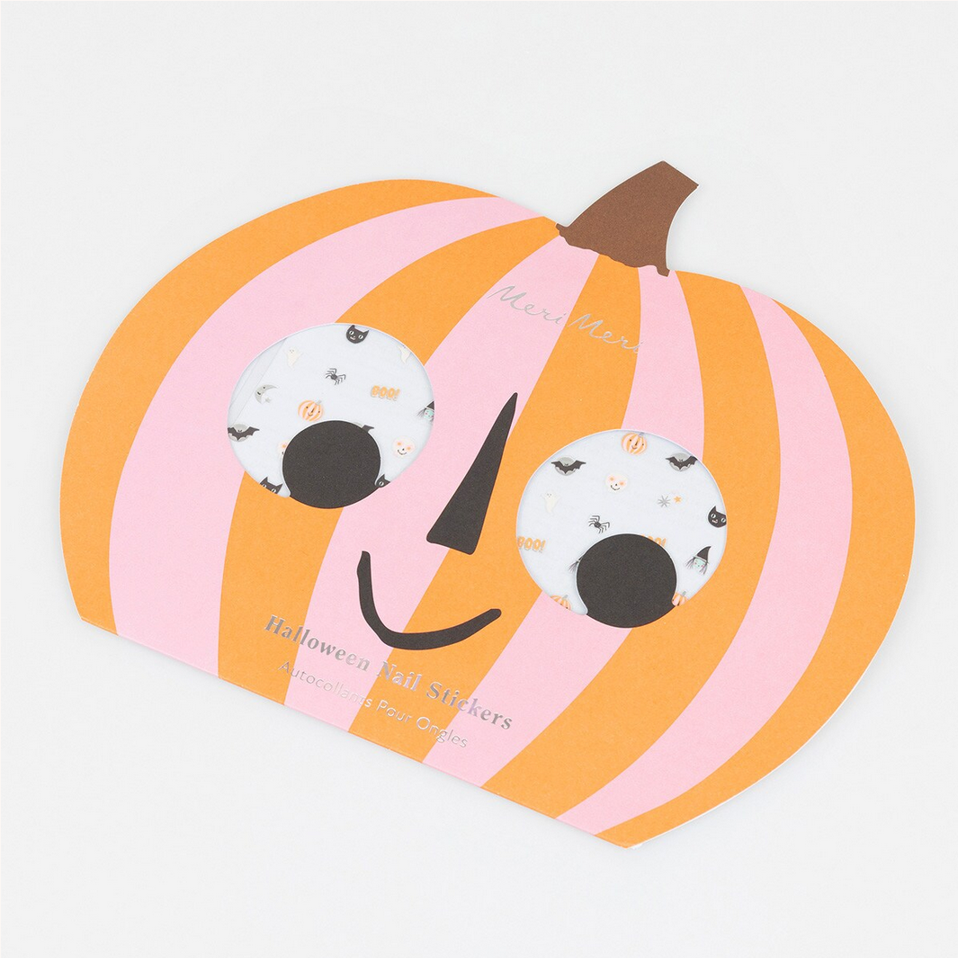 Pumpkin-shaped sticker book with pink and orange stripes and pumpkin designs on a white background