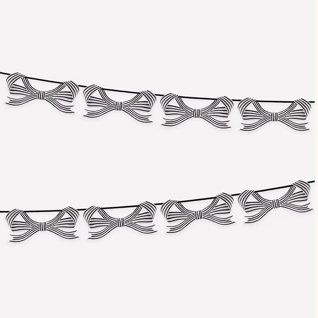 Decorative border with black bows on a white background