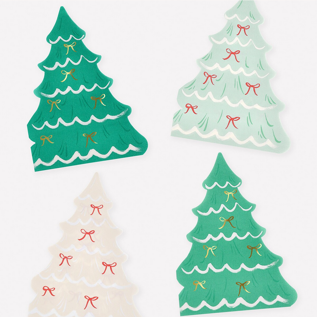 Four decorative paper trees with bows on a white background
