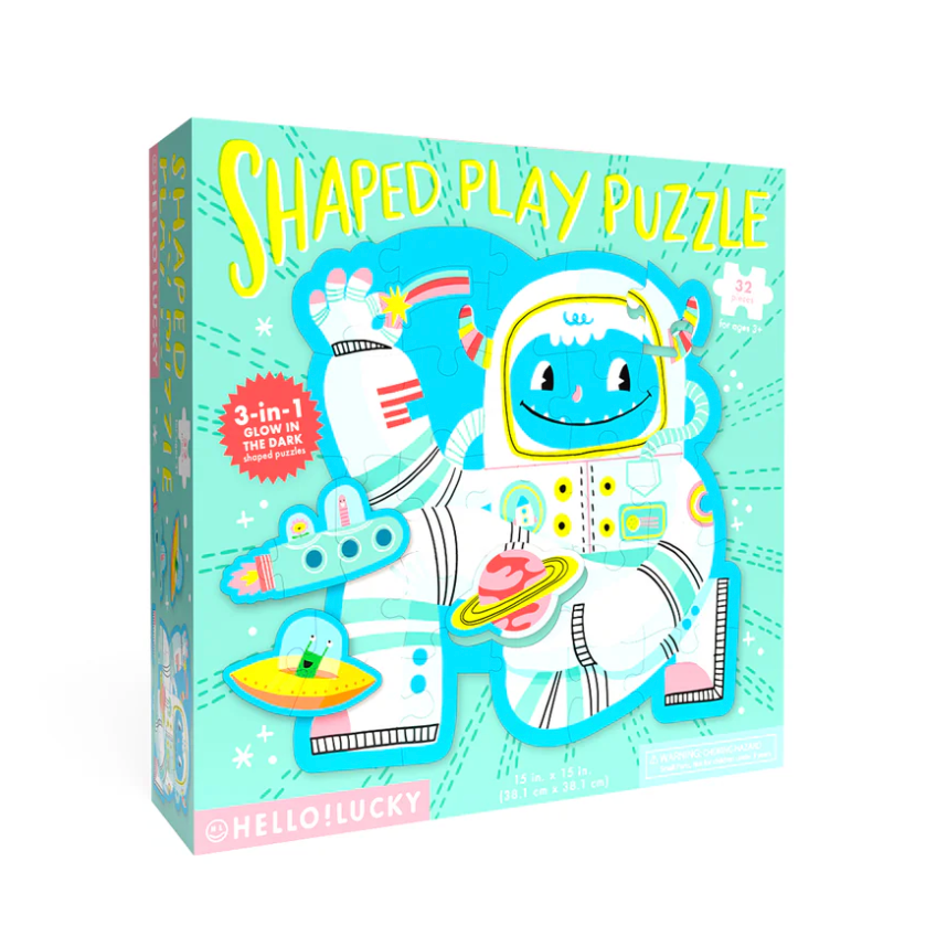 Shaped play puzzle box with cartoon astronaut design on a white background