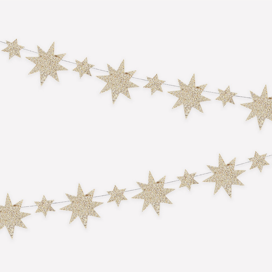 Glittery star garland on a white background