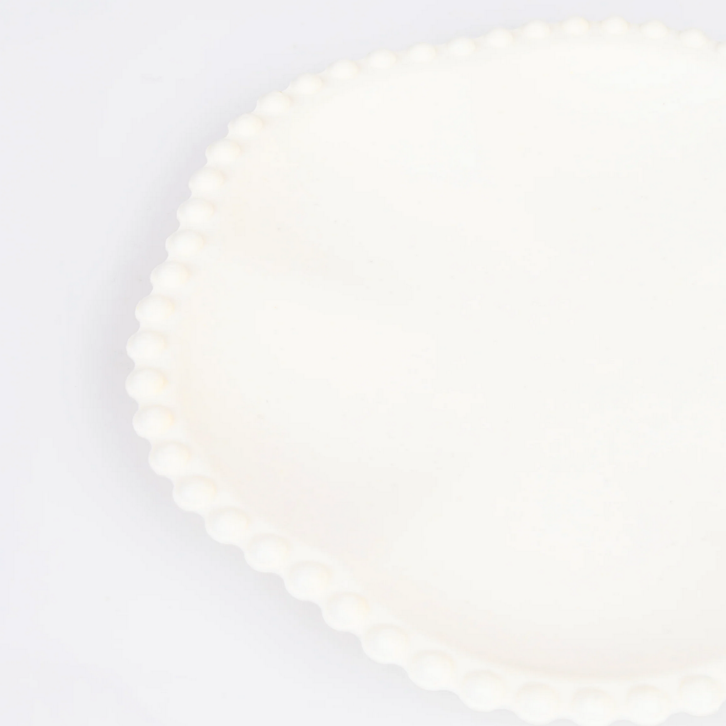 White plate on a light gray background