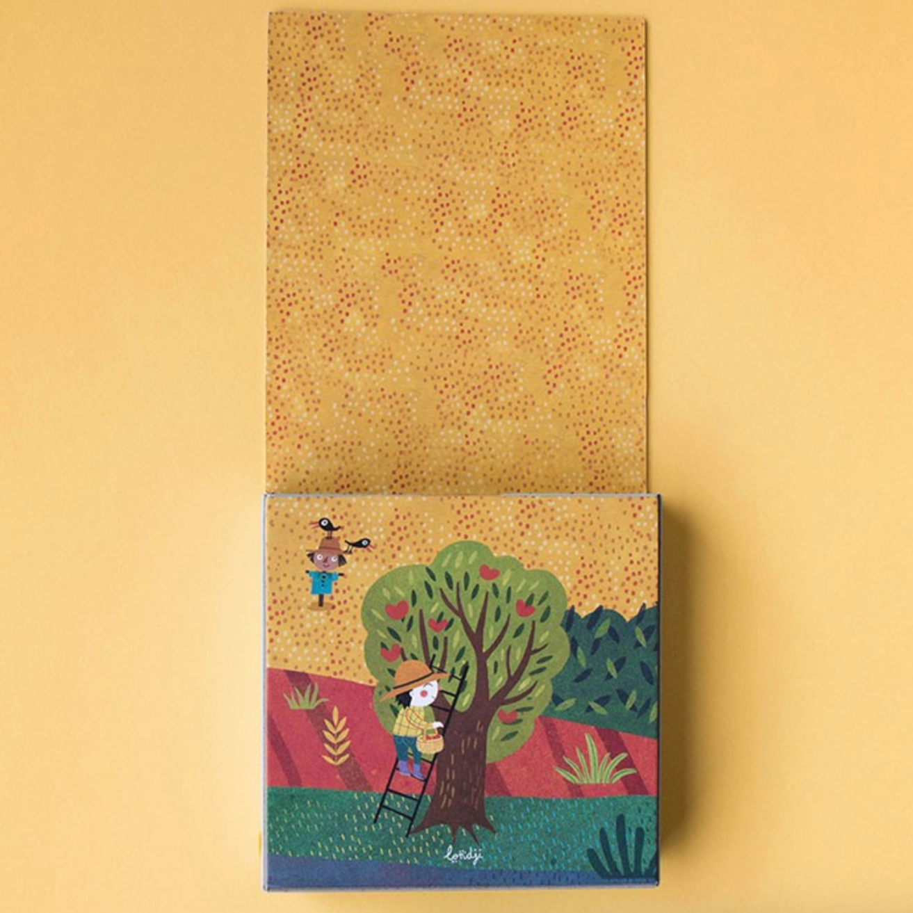 Decorative fabric panel with a cartoon design of a tree and characters on a beige background
