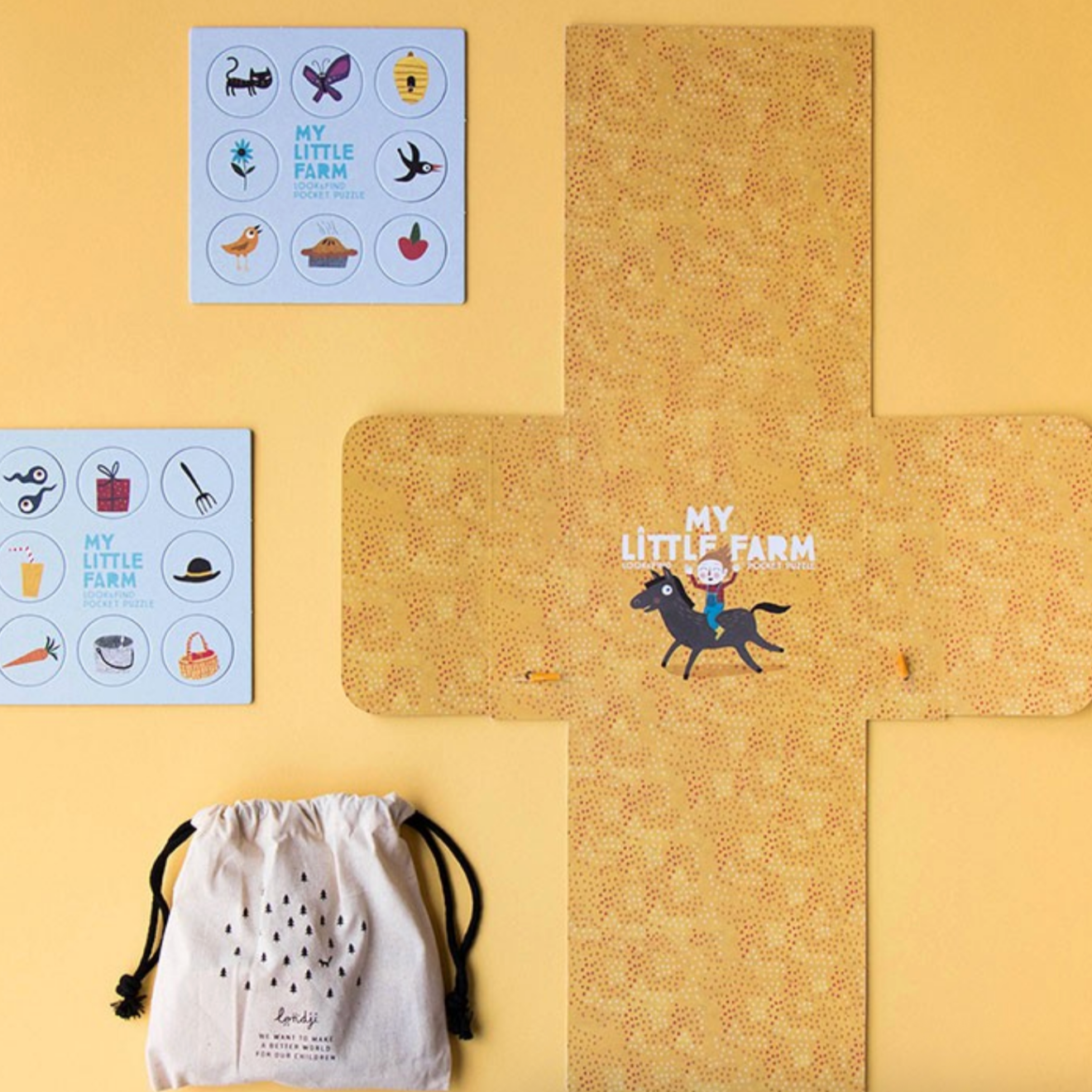 Children's educational materials with 'My Little Farm' theme on a yellow background