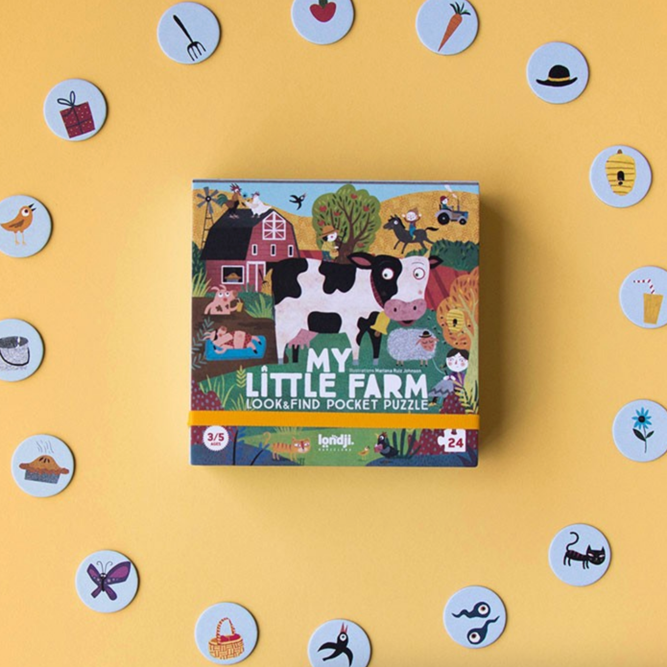 Children's puzzle box titled 'My Little Farm' on a yellow background with farm-themed stickers.
