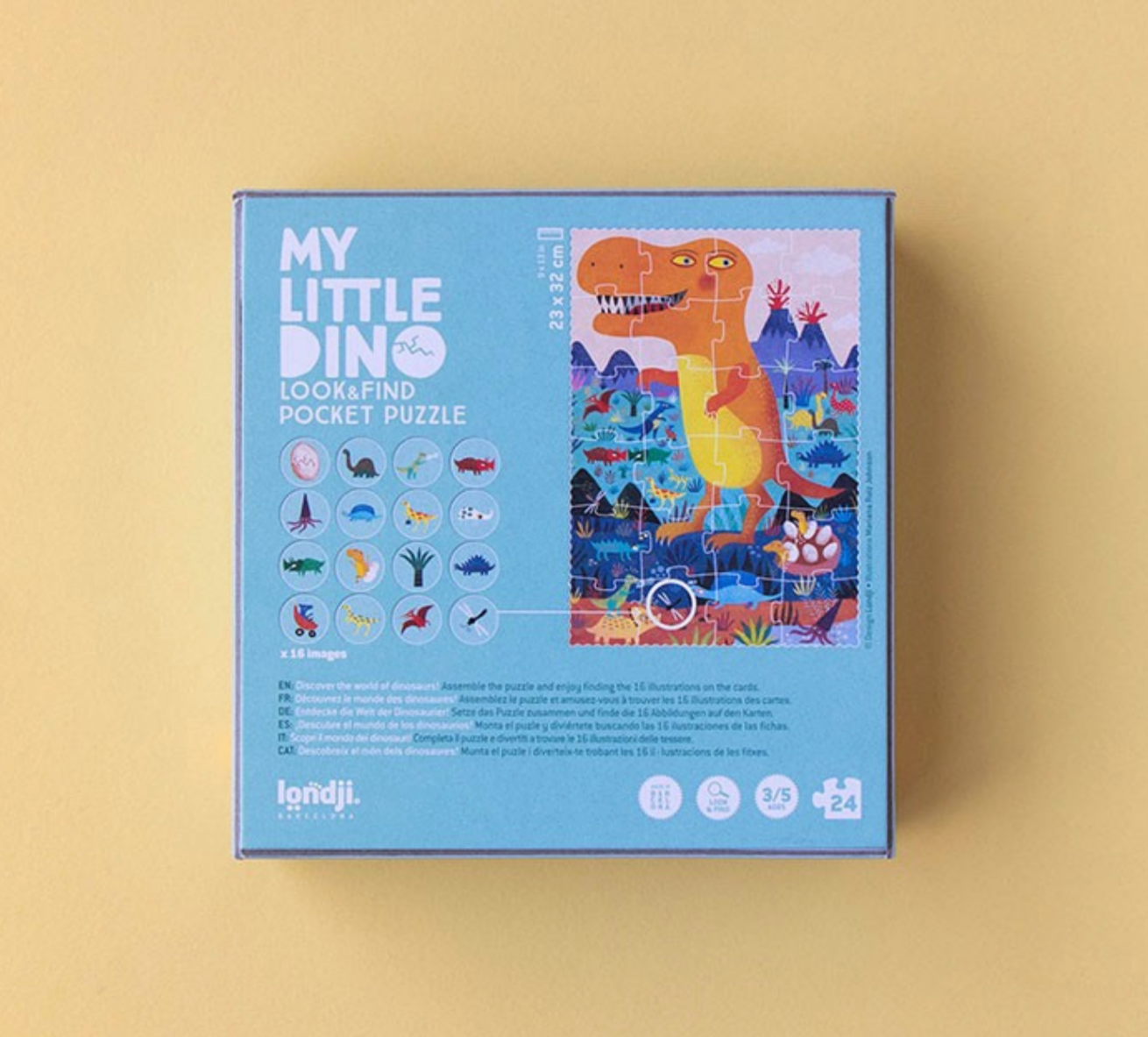 Box of 'My Little Dino' look-and-find pocket puzzle on a beige background