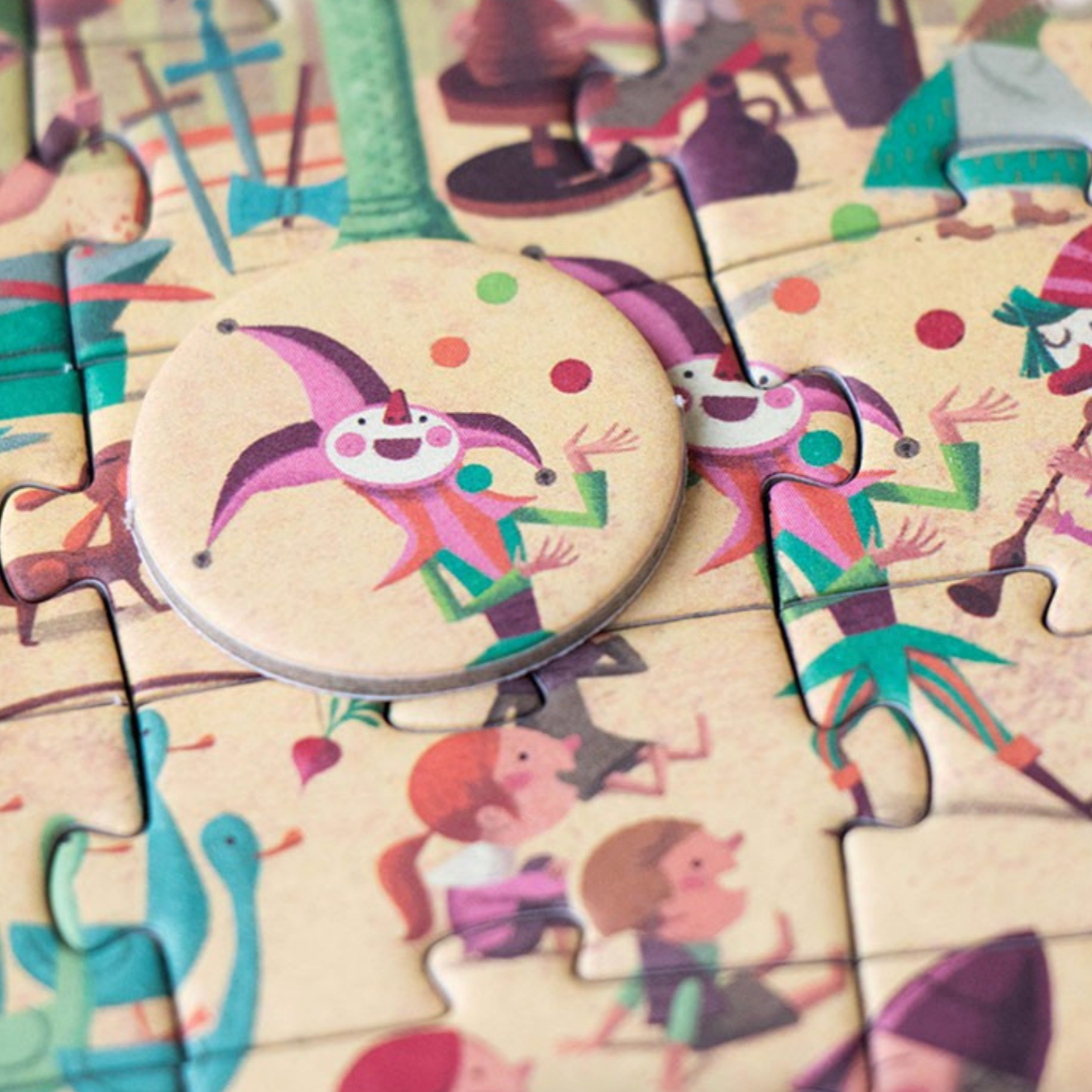 Colorful children's puzzle with cartoon characters on a wooden background