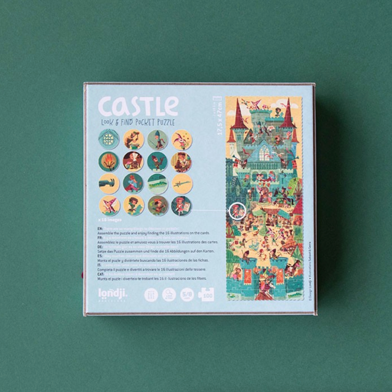 Jigsaw puzzle box with castle design on a green background