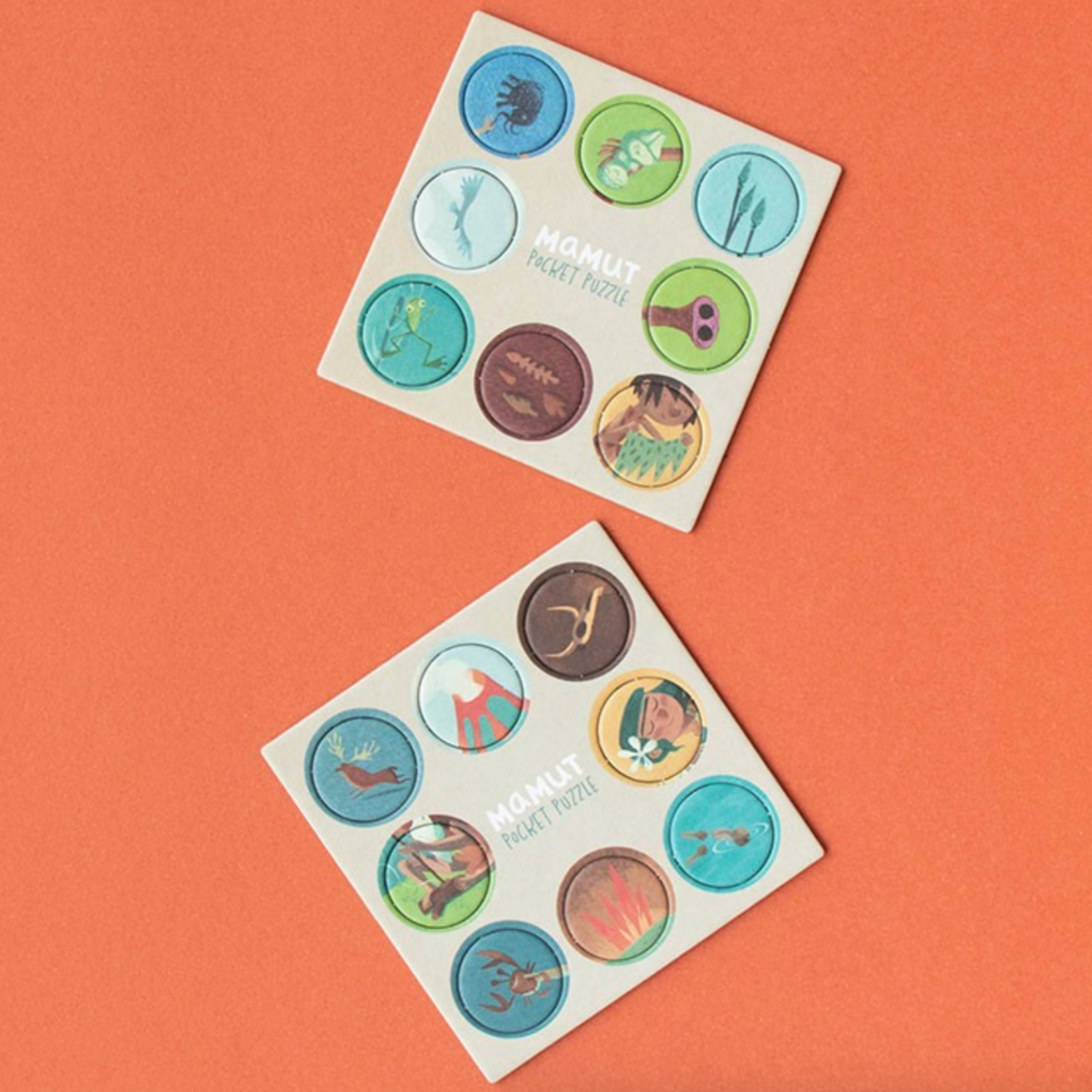 Two sheets of colorful discs on a red background