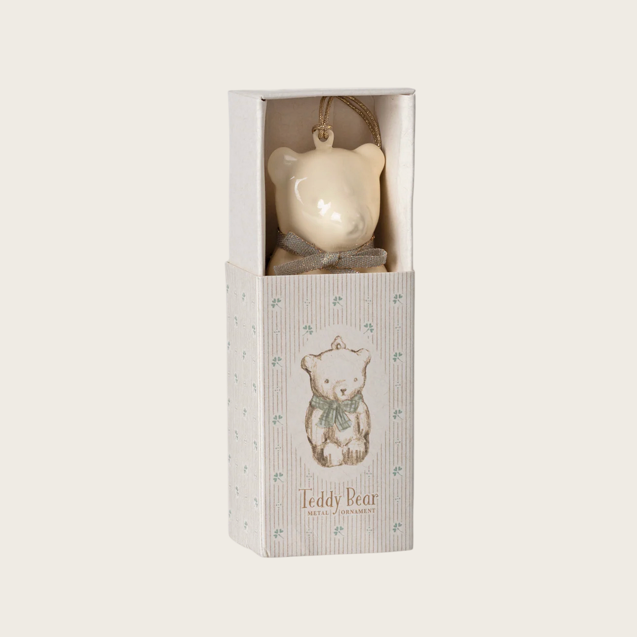 Metallic teddy bear ornament in a box