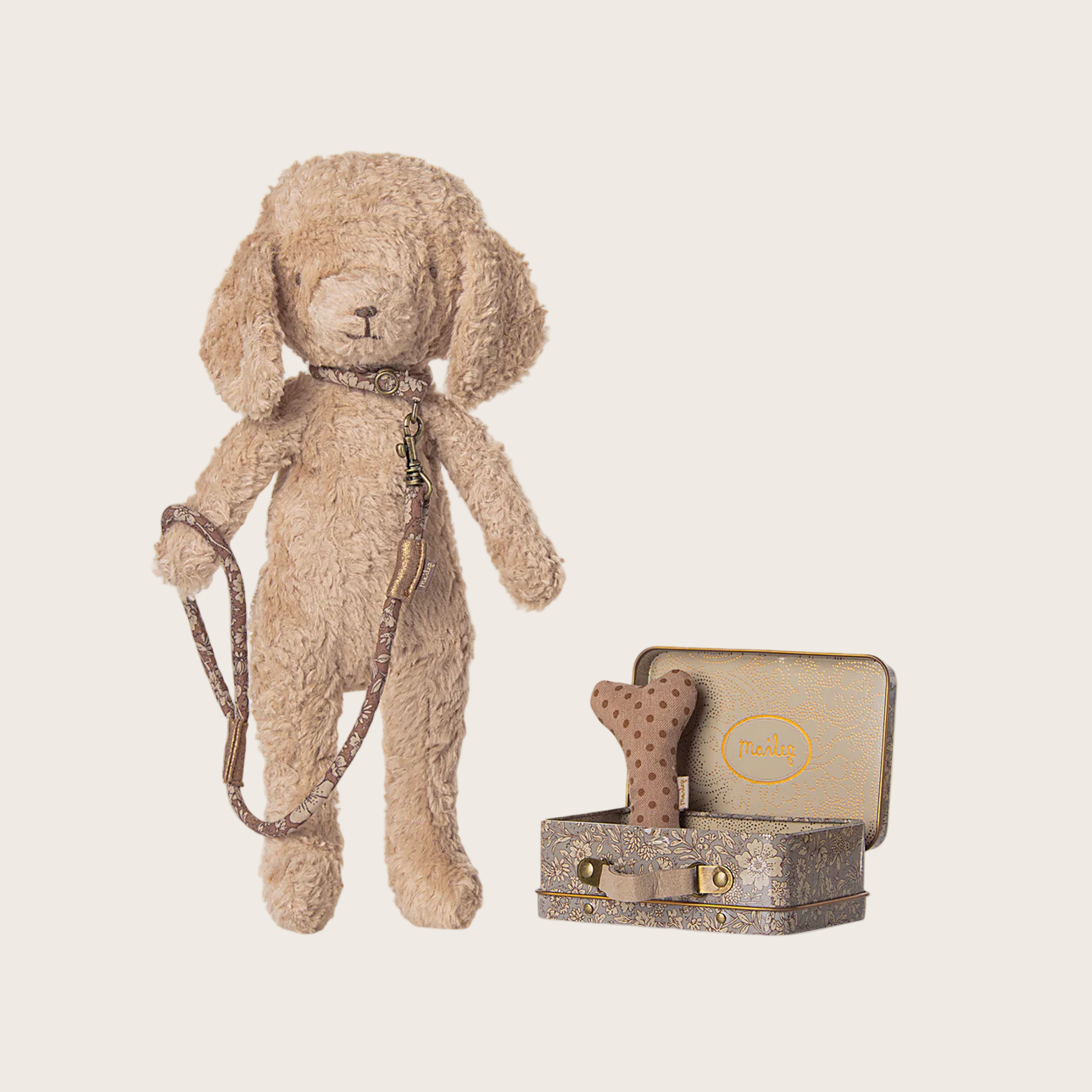 Product page with a plush dog toy, suitcase.