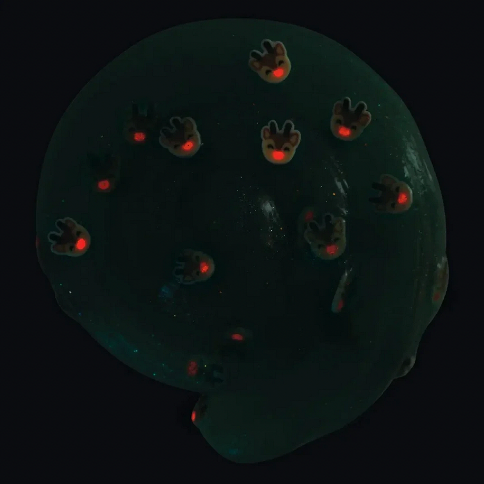Product image with glowing reindeer noses on a dark background