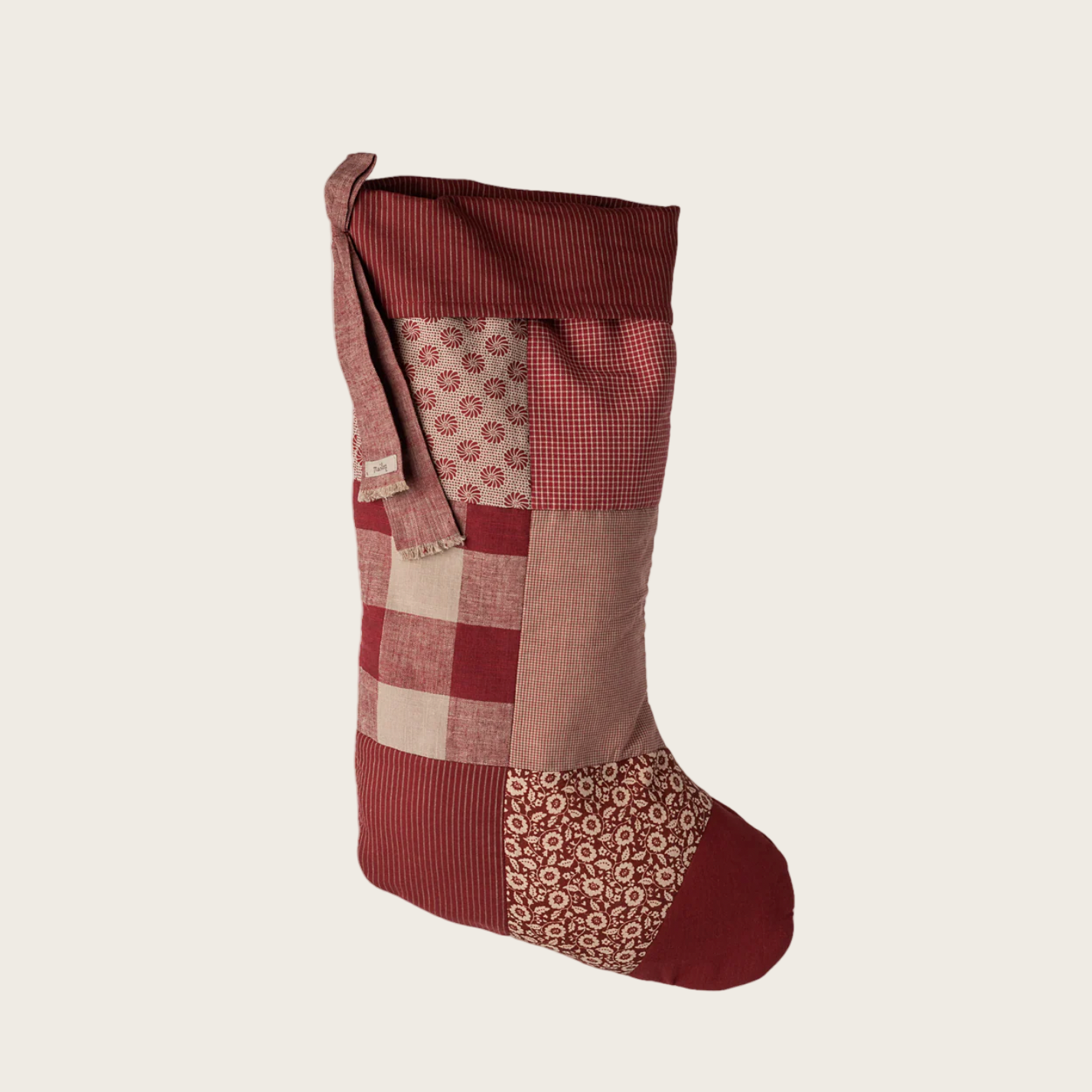 Red and brown patchwork Christmas stocking