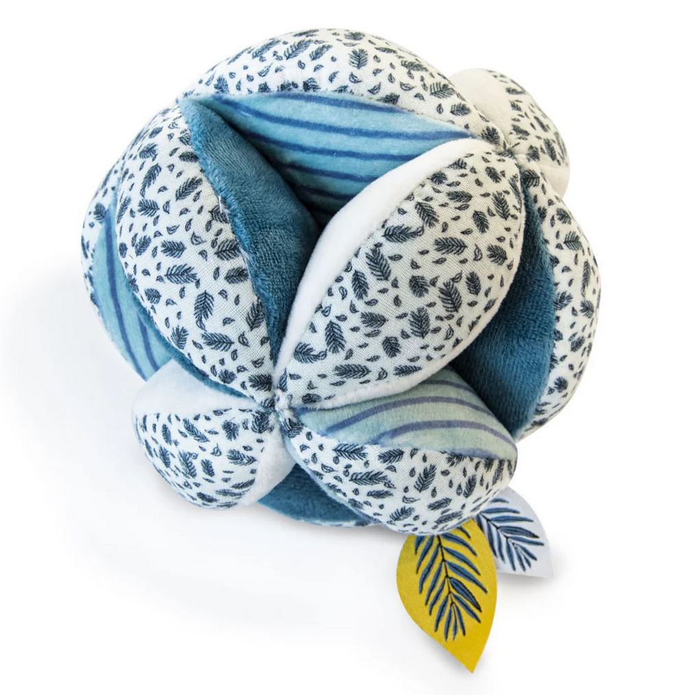 Blue and white patterned ball with a yellow tag on a white background