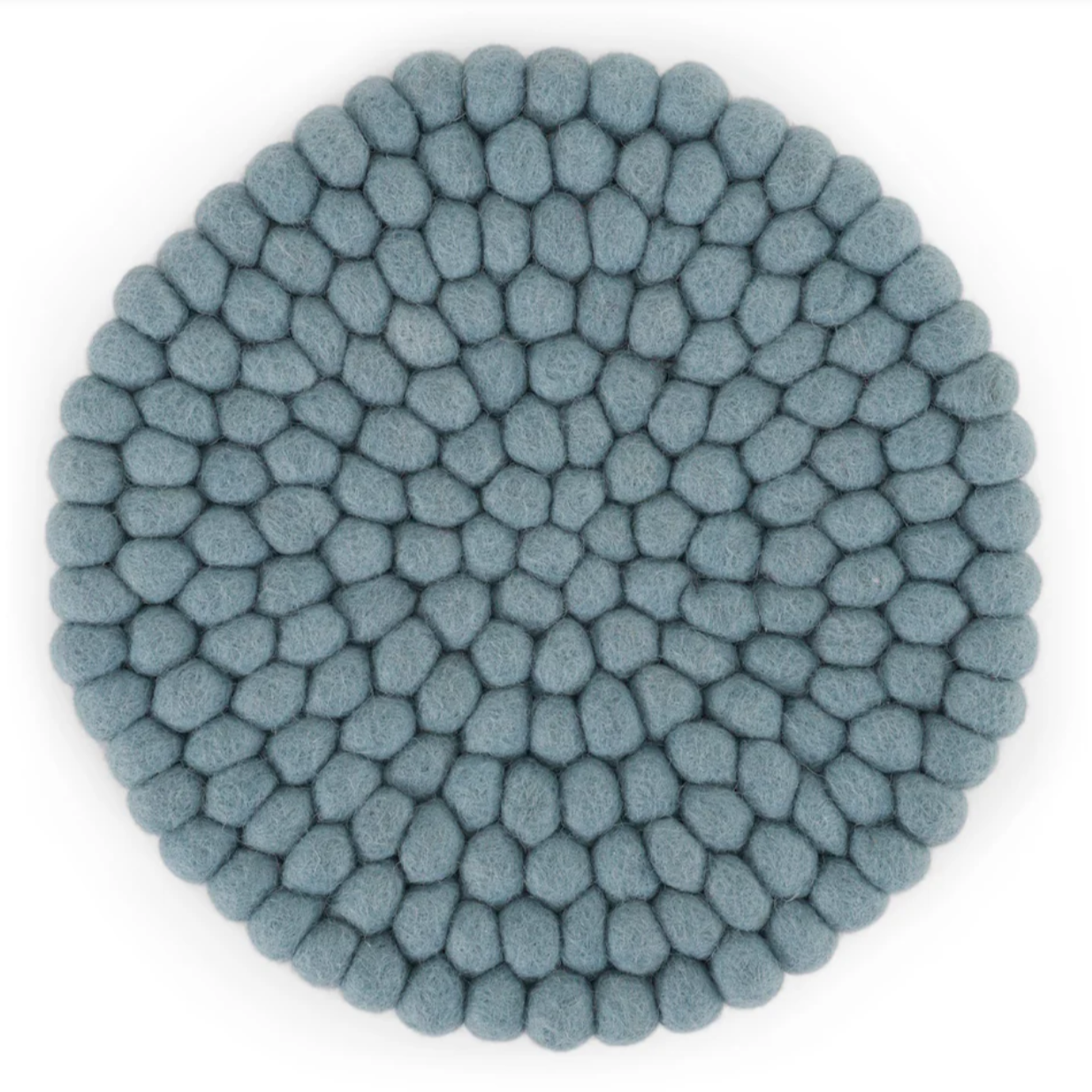 Round blue textured coaster on a white background