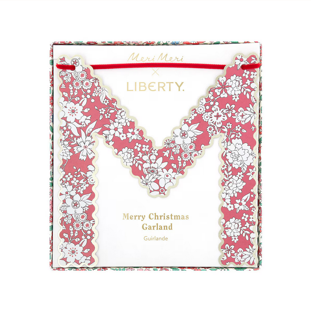 Liberty London Christmas garland packaging with floral design and 'Merry Christmas' text.