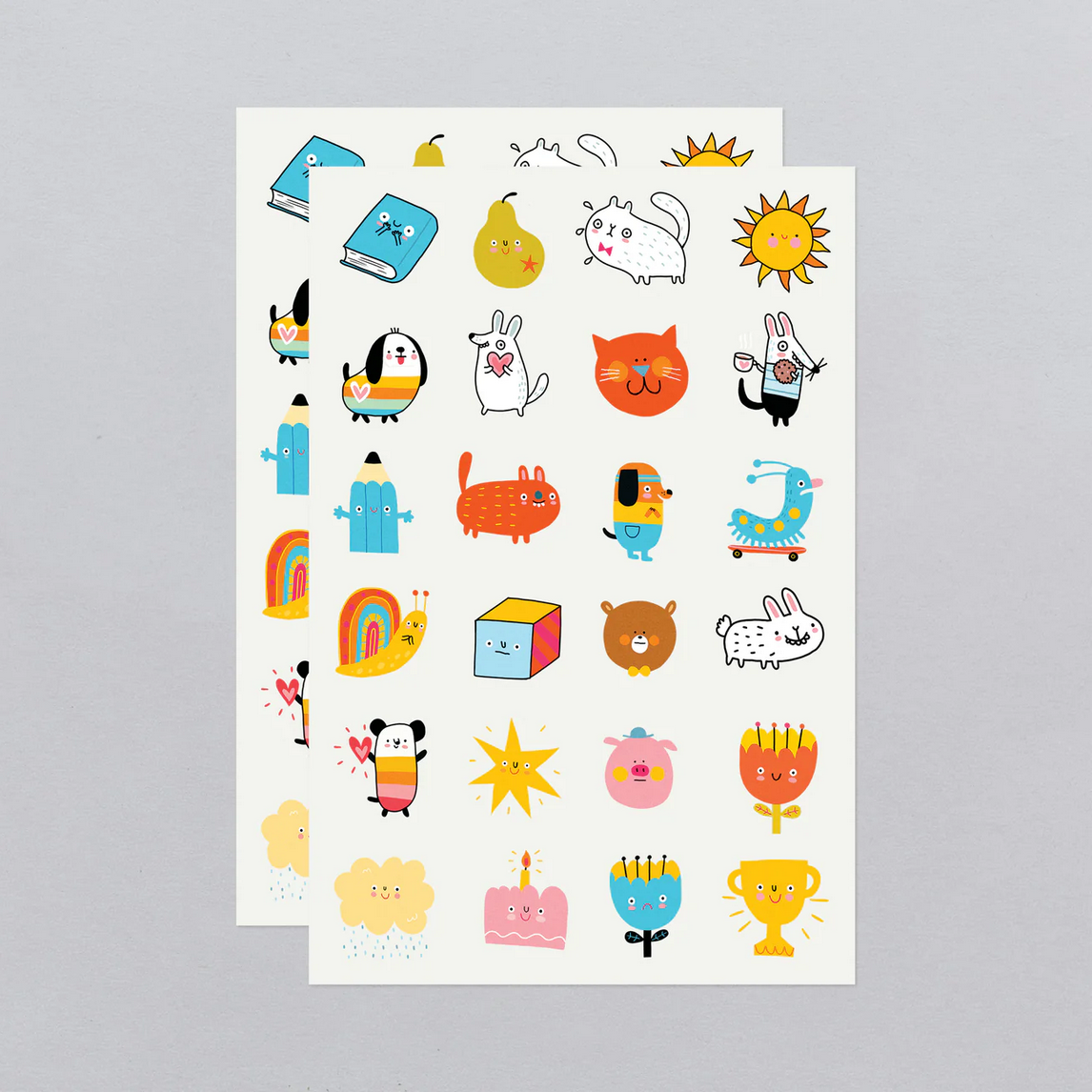 Sheet of colorful cartoon tattoo's on a gray background