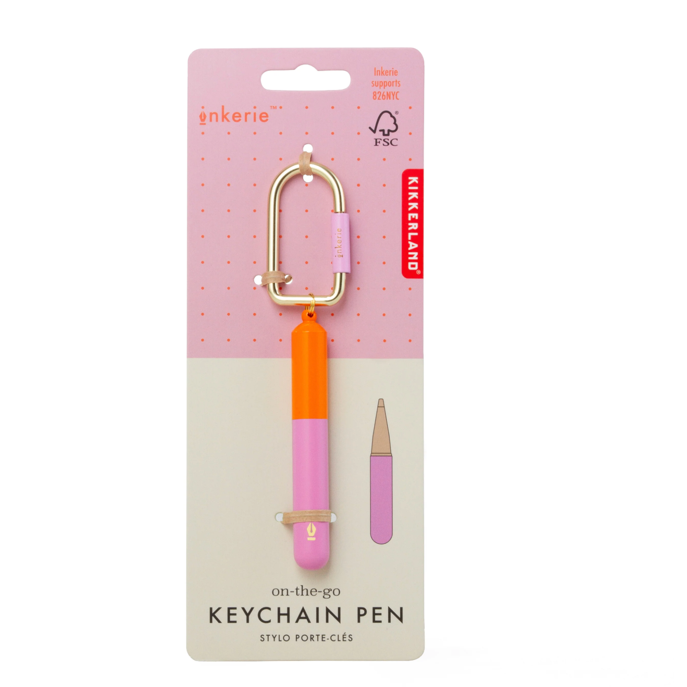Keychain pen with pink and orange design on Kikkerland packaging