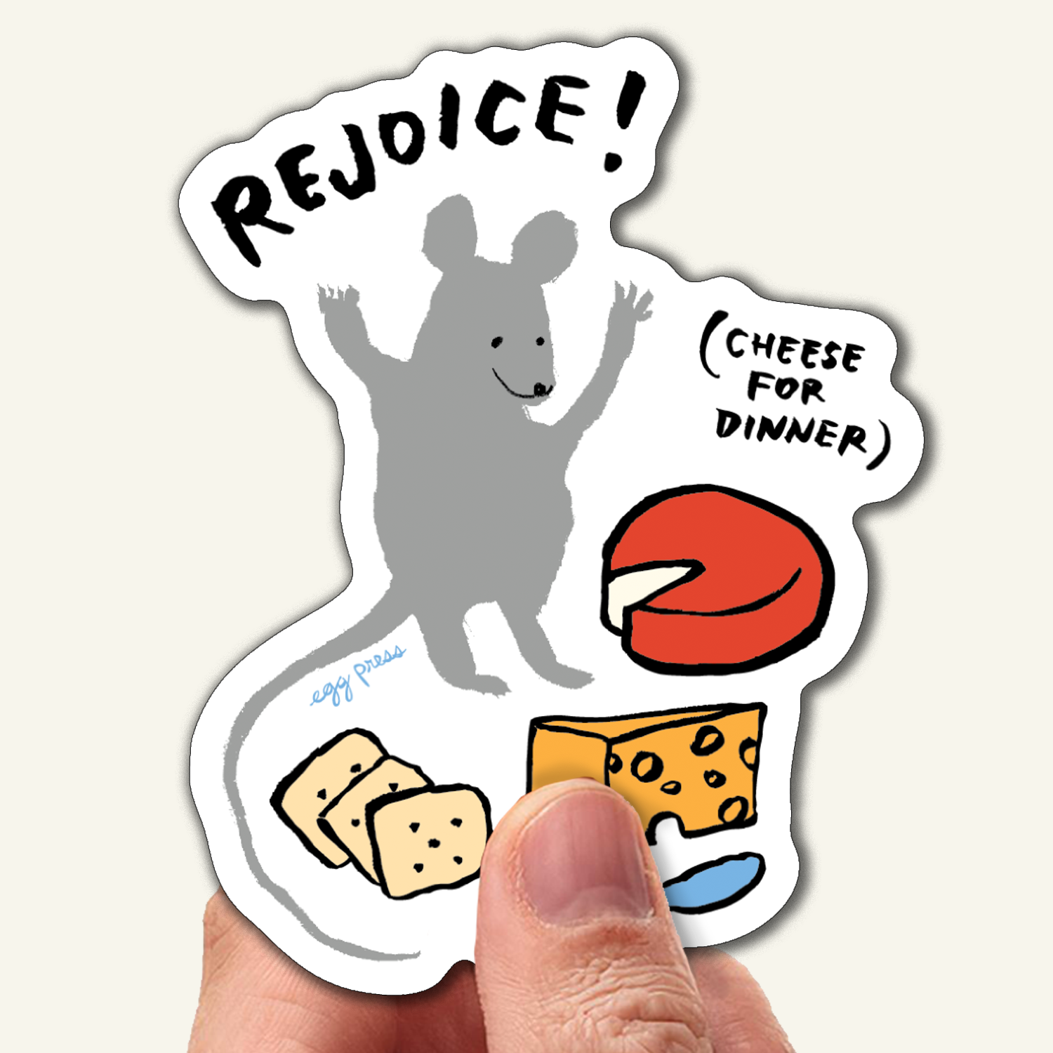 Sticker with a mouse, cheese, and text 'Rejoice! Cheese for dinner' held by a hand.
