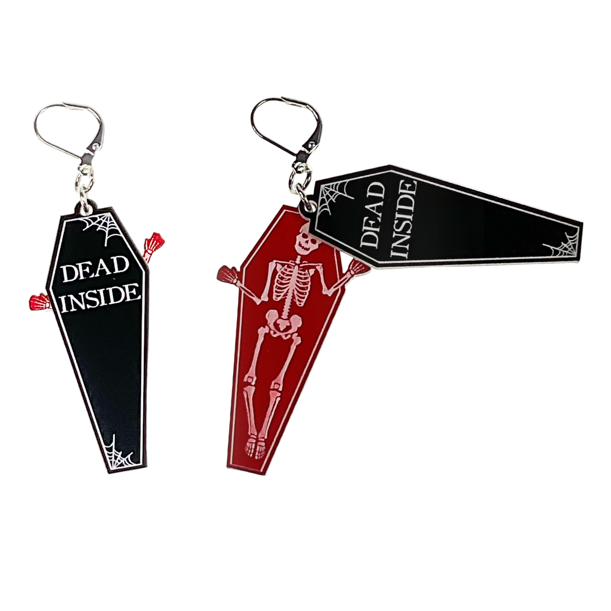 Two coffin-shaped keychains with skeleton designs and 'Dead Inside' text on a white background.
