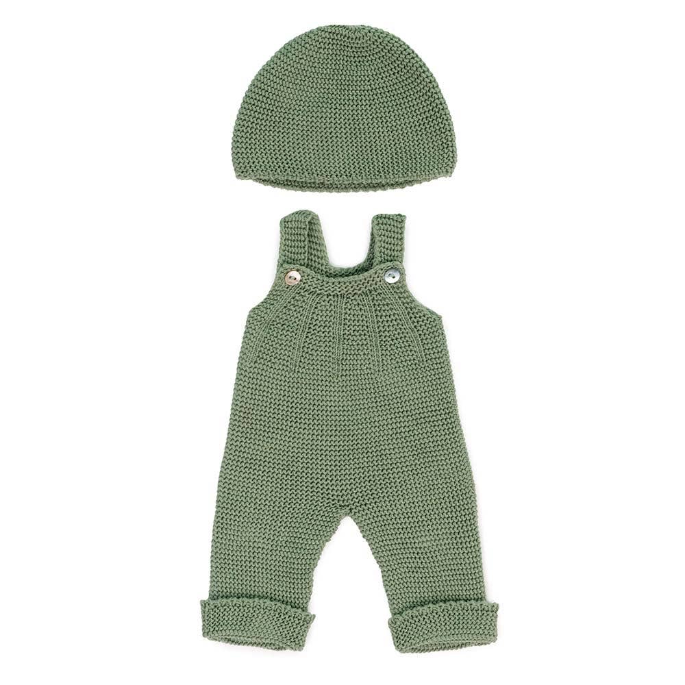 Green knitted doll romper with matching hat on a white background
