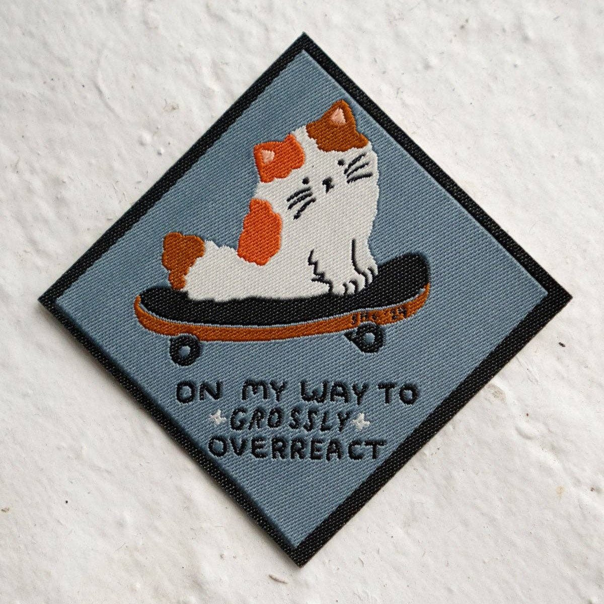 Overreact - Woven Sticky Patch