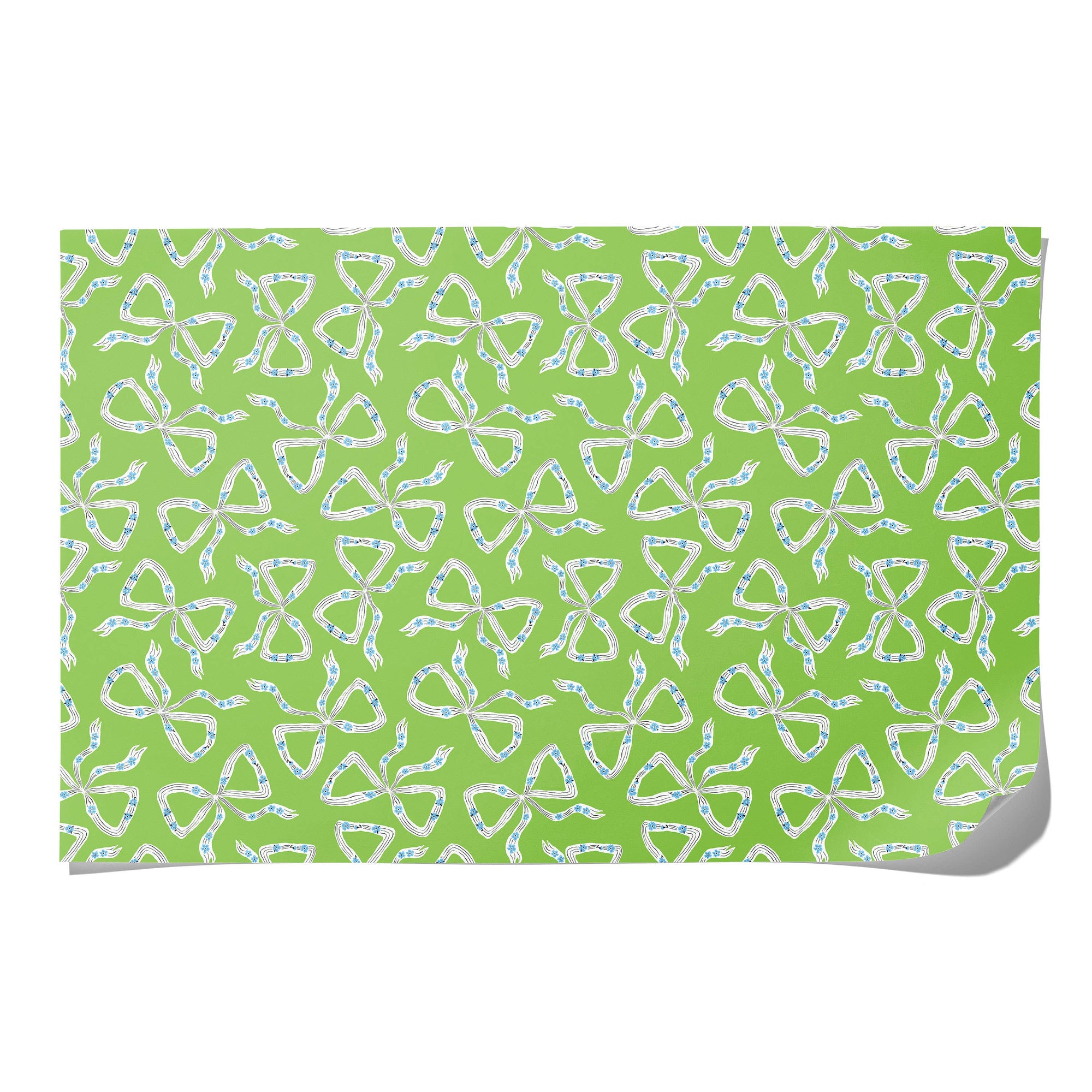 Patterned fabric with white bows on a green background